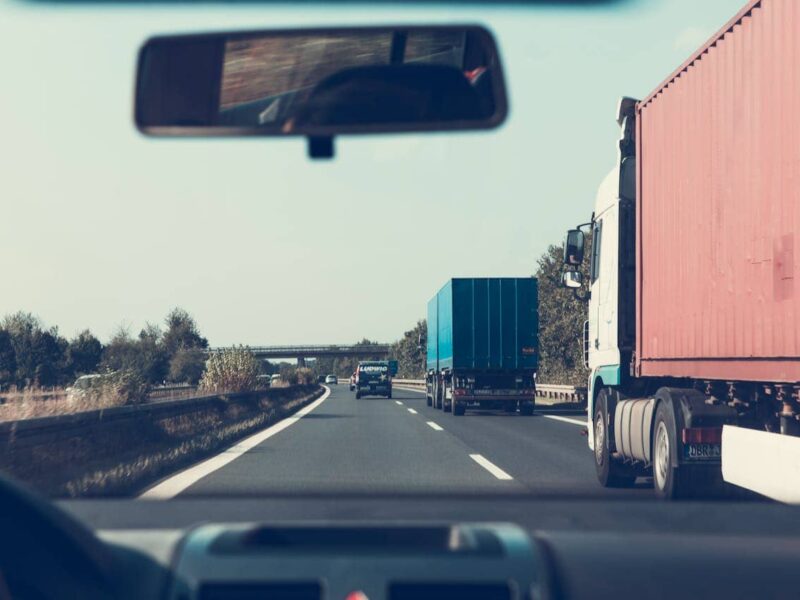 New lorry driver learning the job with mentor at work