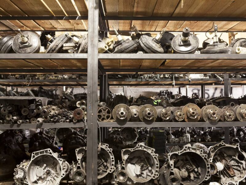 Collage of car parts and online shopping interface, illustrating the changing car parts market in the Netherlands