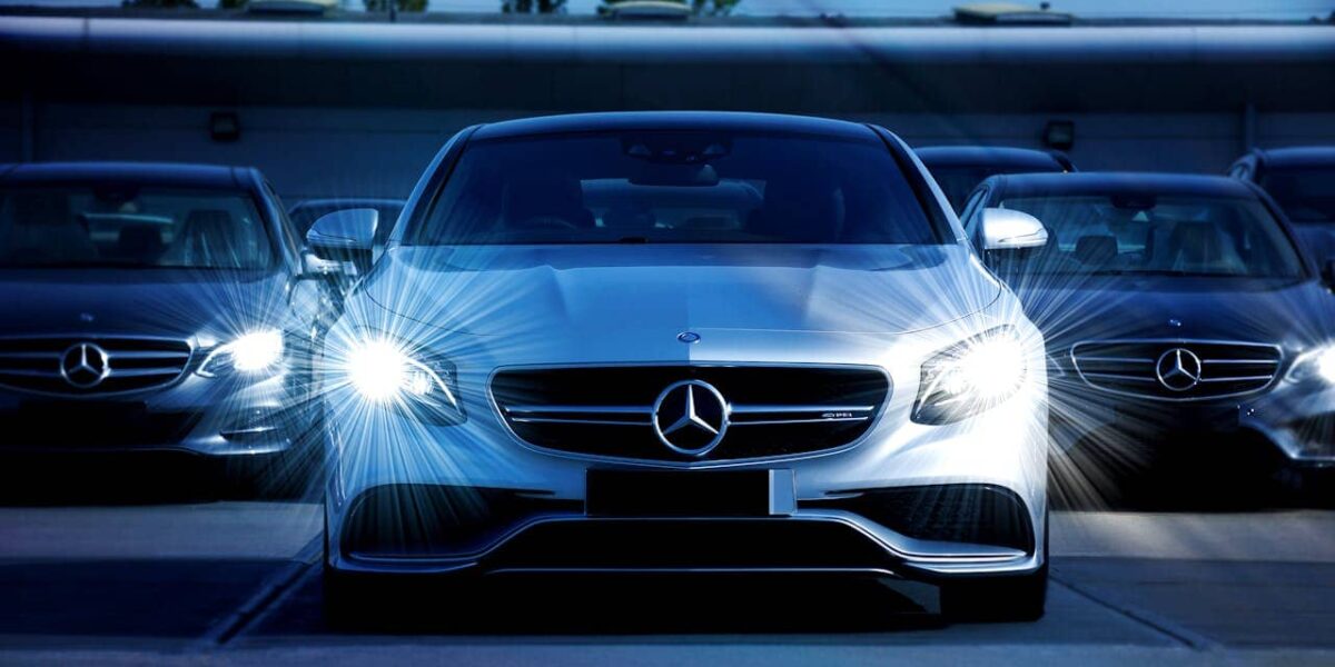 A luxury Mercedes-Benz car in a modern setting, highlighting financial lease options