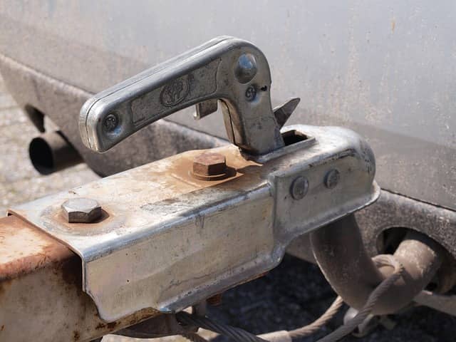 A modern trailer parked outdoors, showing practical design and sturdy build
