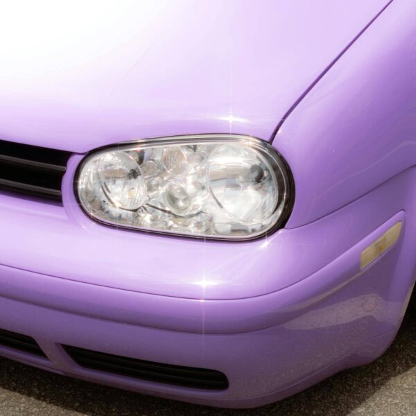 A row of cars in different colours, illustrating car colour and personality