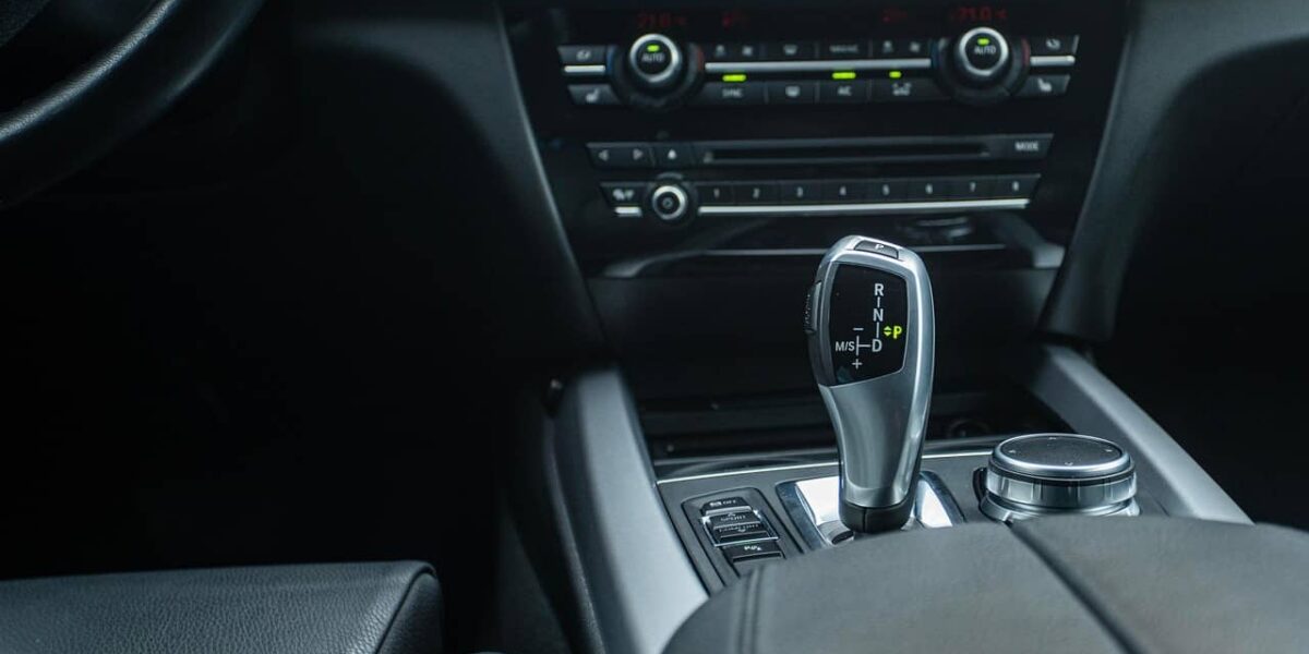 Black car gearstick in close-up