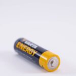 How do you safely replace an LR44 or CR2032 battery in your car key?