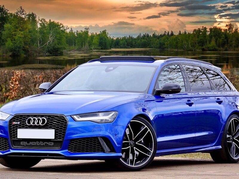 Audi RS6 estate car side view in city street, daytime