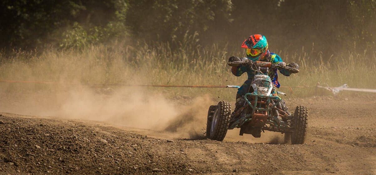 A stylish quad bike parked off road, ideal for car enthusiasts